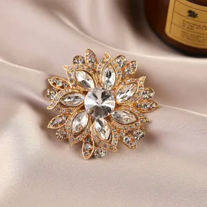 Close-up detail of exquisite crystal flower brooch, sparkling rhinestones on alloy base.