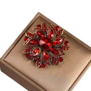 Vintage red crystal flower alloy brooch, elegant fashion women's clothing accessories main view.