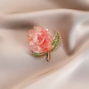 Exquisite pink peony flower brooch with green rhinestone leaves, elegant clothes accessory pin.
