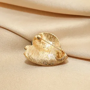 Gold metal brooch pin back view, elegant design suit collar decoration for women stylish accessory.