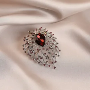 Elegant rhinestone flower bouquet brooch for women, sparkling red teardrop crystal pin jewelry.