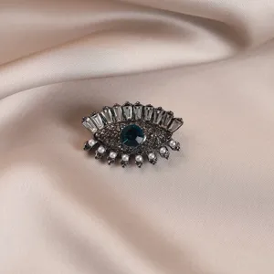 Raffinata ed elegante spilla a forma di occhio con cristallo blu e perle donne