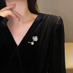 Elegant pearl flower brooch for women, exquisite crystal pin accessory for clothes.
