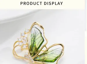 Elegant green translucent butterfly brooch with sparkling cubic zirconia for women gift.