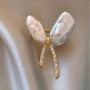 Elegant pearl zircon bow brooch pin, chic suit dress lapel accessory for women daily wear.