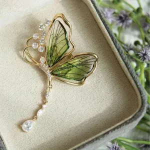 Forest style translucent butterfly brooch with crystal zircon and tassel, main shot.