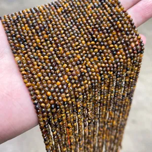 Close-up macro view of faceted natural yellow tiger eye loose beads for DIY jewelry making