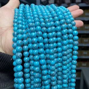 Wholesale strings of synthetic blue turquoise round beads for DIY jewelry making crafts