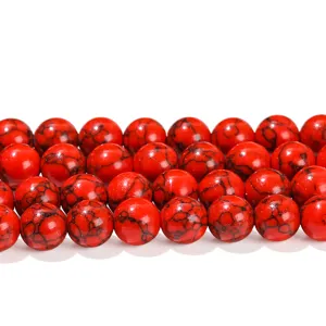 Vibrant red synthetic turquoise round beads with black spiderweb patterns for DIY jewelry