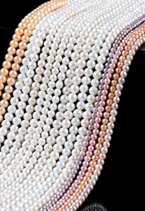 Close-up of multicolored natural freshwater pearls with high luster for DIY jewelry.