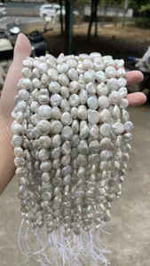Detailed view of natural white Baroque coin pearls for DIY jewelry making