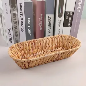 Macro detail of the hand-woven natural seagrass storage basket for bread and snacks.