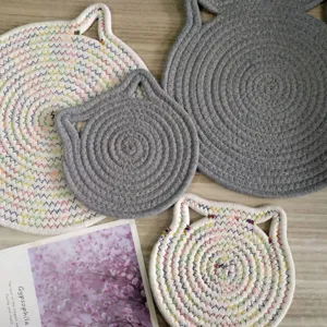 Detail showing texture of cat ear shaped handmade cotton rope pot mats