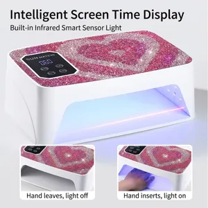 Detail of heart rhinestone UV LED nail lamp with smart sensor and digital timer screen.