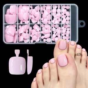 Full set of 120 nude pink press-on toenails in a clear organizer box for easy application.