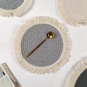 Nordic round braided cotton placemat with stylish fringe edge for dining table decoration.