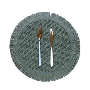 Round woven placemat with fringe handmade paper rope table mat for kitchen dining table decor.