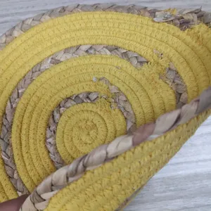 Nordic woven placemat detail shot, natural gourd grass and cotton heat insulation table mat.