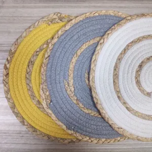 Round braided cotton thread and straw placemat detail, heat resistant table mat in multi colors.