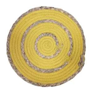 Round braided woven placemat made of natural grass and yellow cotton thread heat resistant table mat.