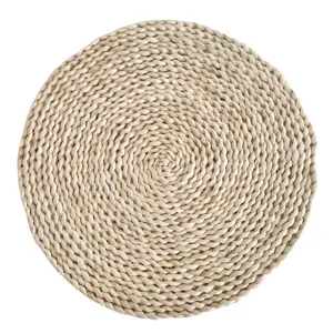 Round woven corn husk placemat natural straw table mat heat resistant dining pad decor.