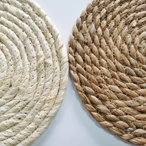 Close-up macro view of woven straw placemats, highlighting natural texture and detailed craft.