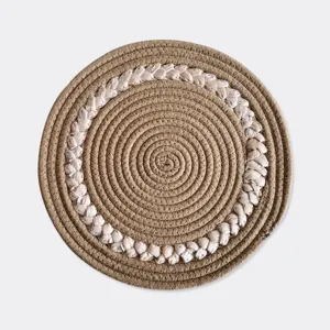 Nordic style woven heat insulation mat, round cotton rope and braided straw detail shot.