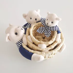 Detailed view of nested straw storage baskets featuring cute sailor bear plush dolls set.