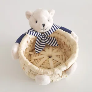 Woven storage basket with cute plush bear design and sailor collar for desktop organization.