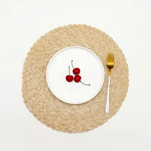 Round woven ramie cotton placemat, natural braided table mat, heat-resistant kitchen dining decor.