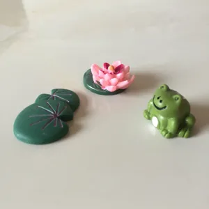 Miniature resin landscape figurines set featuring a cute frog, lotus, and lily pads