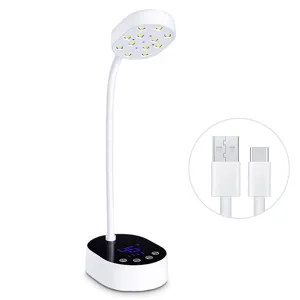 Close-up of a white desktop UV LED nail lamp showing LED beads and USB charging cable