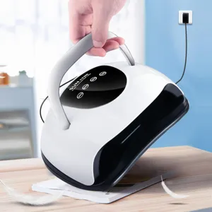 Professional white SUN X9 Plus UV LED nail lamp featuring an ergonomic handle and sleek design