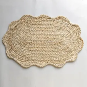 Detailed close-up view of the natural corn husk woven placemat showing its fine texture.