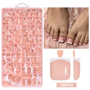 Detailed view of 160 pieces French style short nude toe press-on nails in box