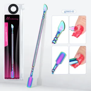 Detail view of double-ended iridescent stainless steel nail cuticle pusher tool set