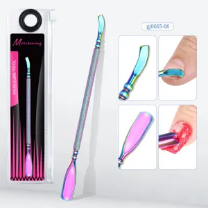 Detail view of rainbow titanium double-ended nail cuticle pusher with use case close-up