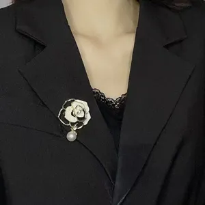 Elegant camellia pearl brooch, vintage floral lapel pin for women's winter coat blazer.