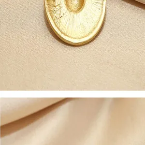 Vintage gold hat brooch pin for women suit accessory, elegant metallic lapel pin jewelry.