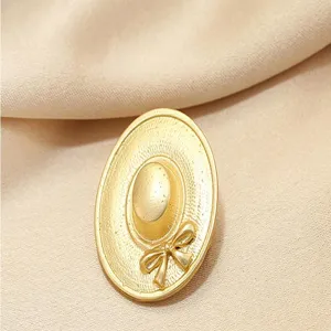 Retro gold hat brooch detail shot, elegant metal corsage for women's blazer accessories