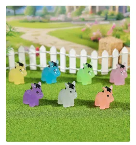 Macro view of colorful luminous horse miniatures arranged on a miniature artificial lawn