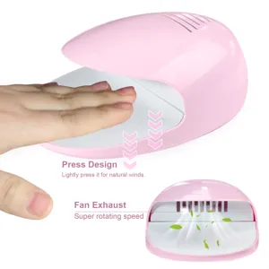 Portable pink nail polish dryer with fan exhaust and press design for quick drying
