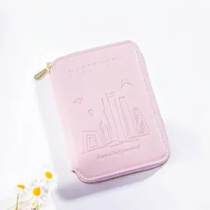 Porta passaporto rosa minimalista in pelle con protezione RFID e skyline goffrato