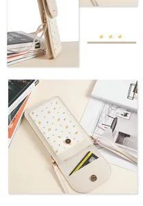 Close-up detail of cream floral touch screen phone bag featuring card slot and magnetic snap