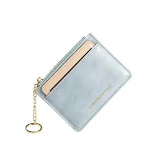 Elegante hellblaue und beige Kunstleder-Geldbörse mit goldenem Schlüsselbund Damen