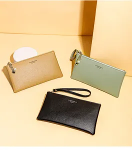 Minimalistische Damen-Handgelenktaschen in Braun, Grün und Schwarz mit Narbenlederstruktur