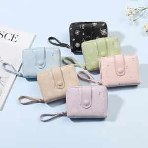 Petits portefeuilles à imprimé marguerite avec fermeture éclair et dragonne