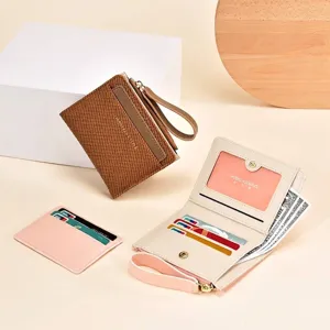 Petit portefeuille minimaliste pour femme avec large dragonne et fentes cartes
