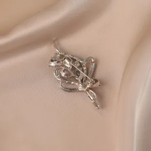 Detailed back view of a vintage silver wheat ear brooch showing the safety pin clasp