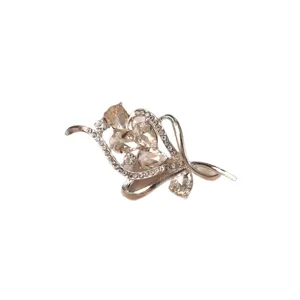 Elegant wheat ear brooch with sparkling champagne crystals on a silver alloy base